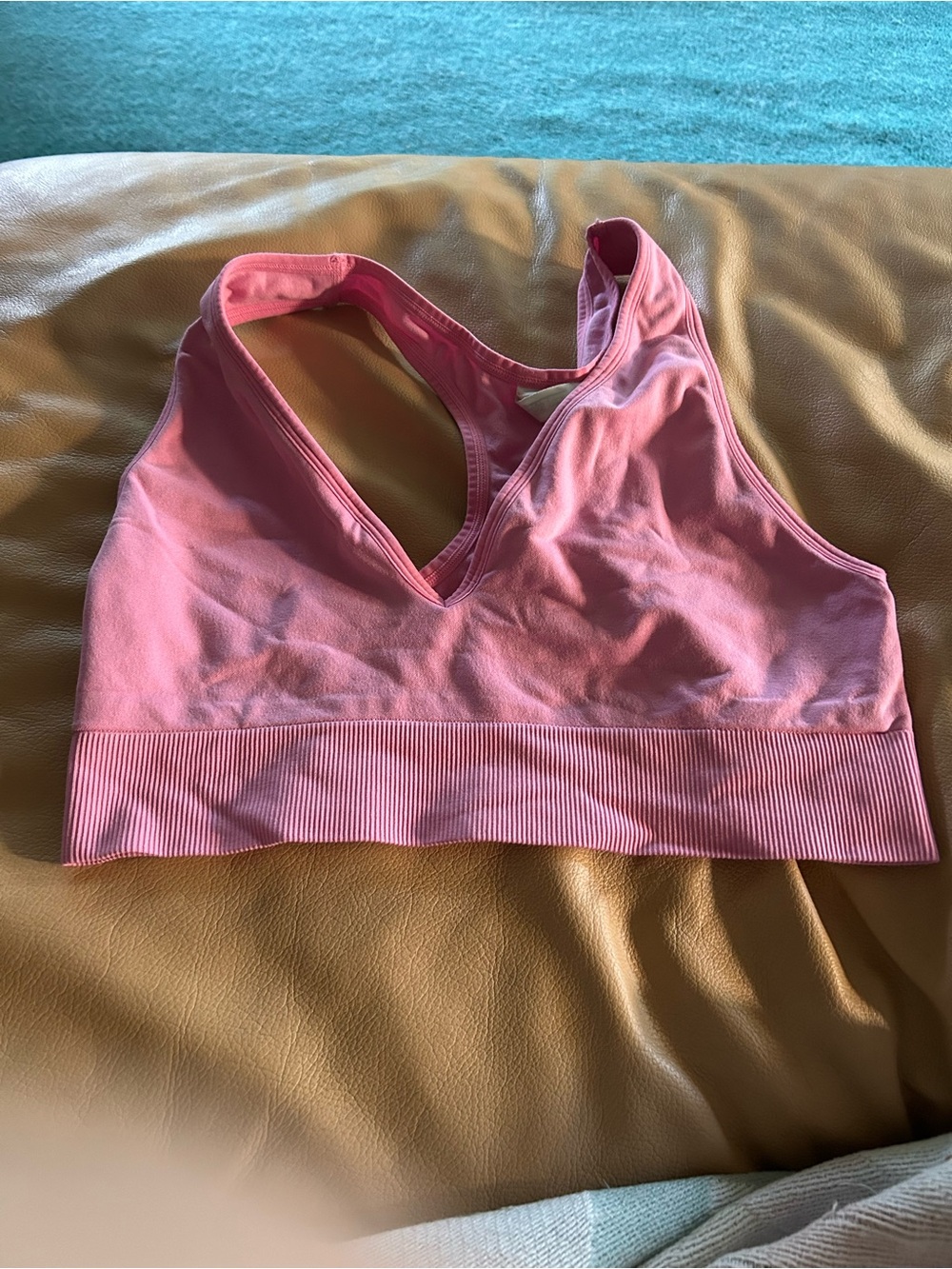 3 sports bras. Size large. Pink & hunter green are PINK. Teal is all in motion